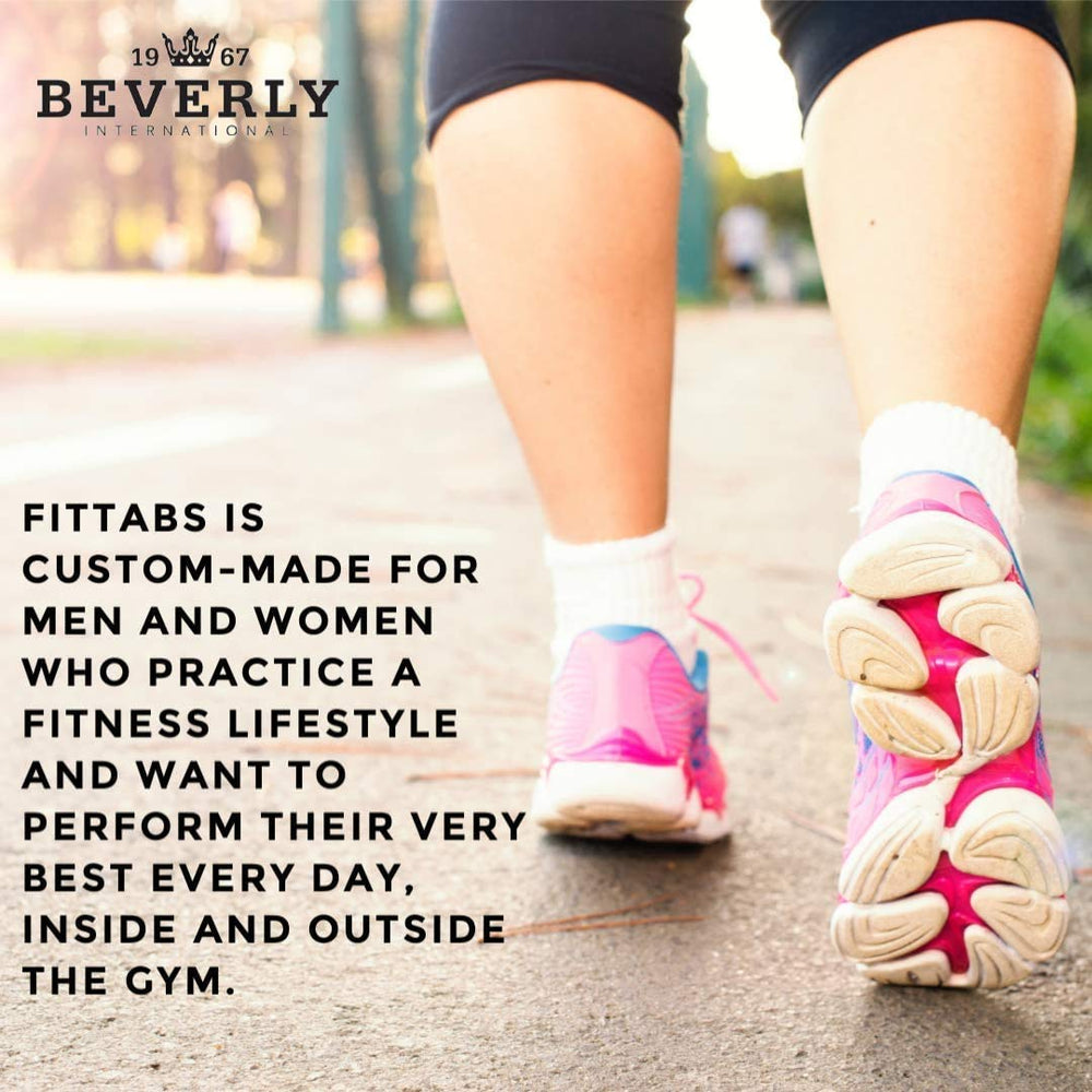 Morning routine with FitTabs and water for metabolism support.