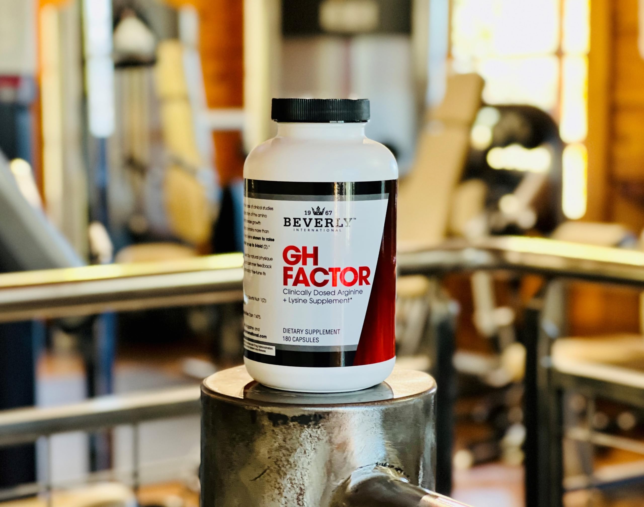 Beverly International GH Factor capsules with workout gear illustrating post-workout recovery potential.