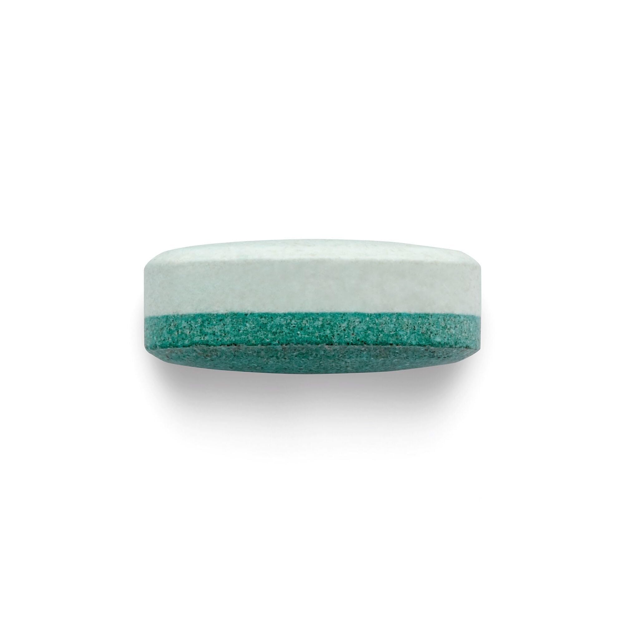 BEYOND RAW Anabolic Sleep scoop beside glass for nightly serving.