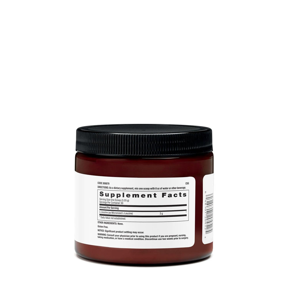 Beyond Raw L-Leucine powder scoop ready to blend into a workout drink