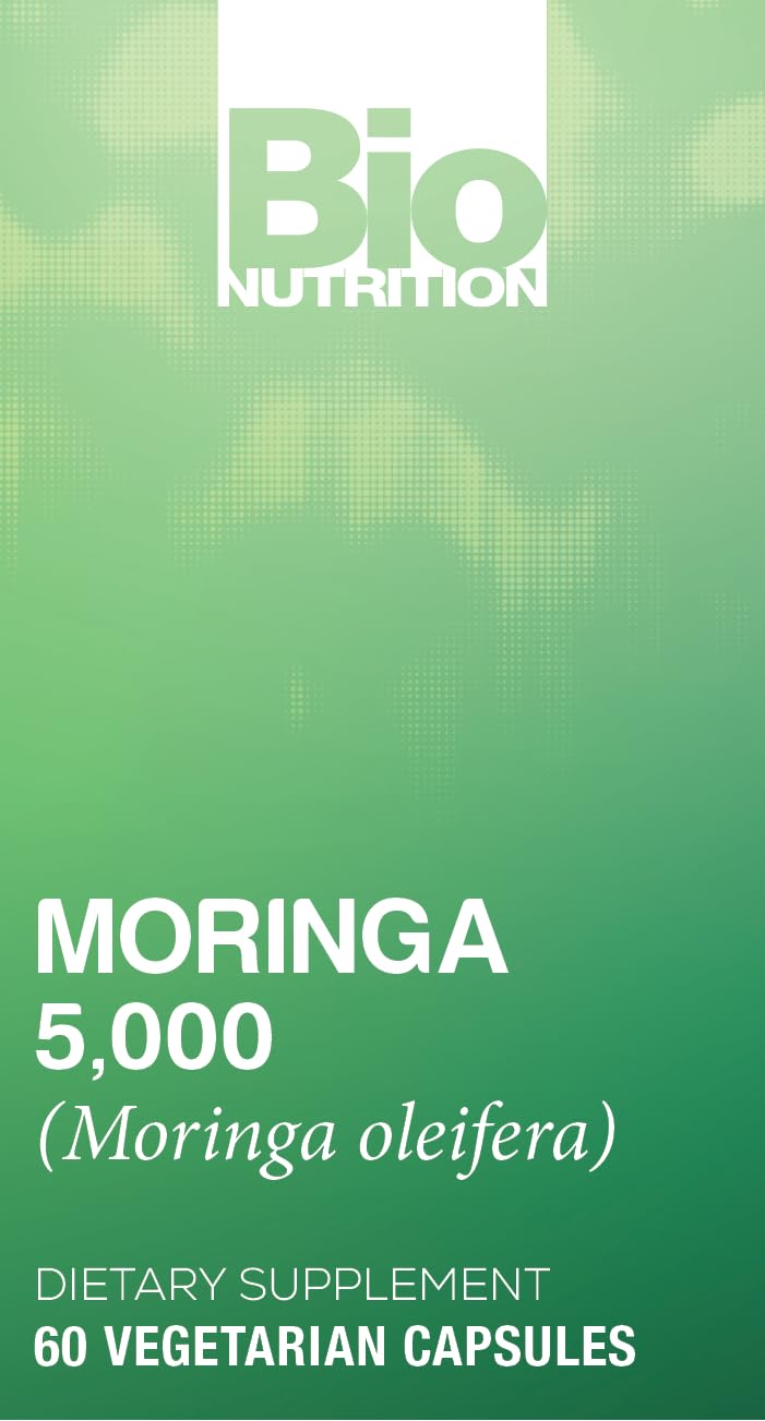 Bio Nutrition Moringa 5000mg capsules on green leaves for natural energy.