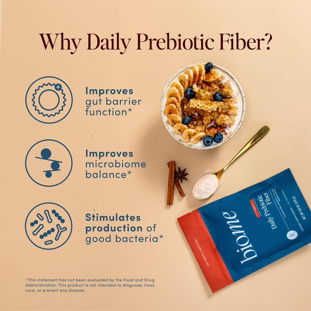 Bio.me Daily Prebiotic Fiber Powder Chai in a glass shake for on-the-go digestion support.