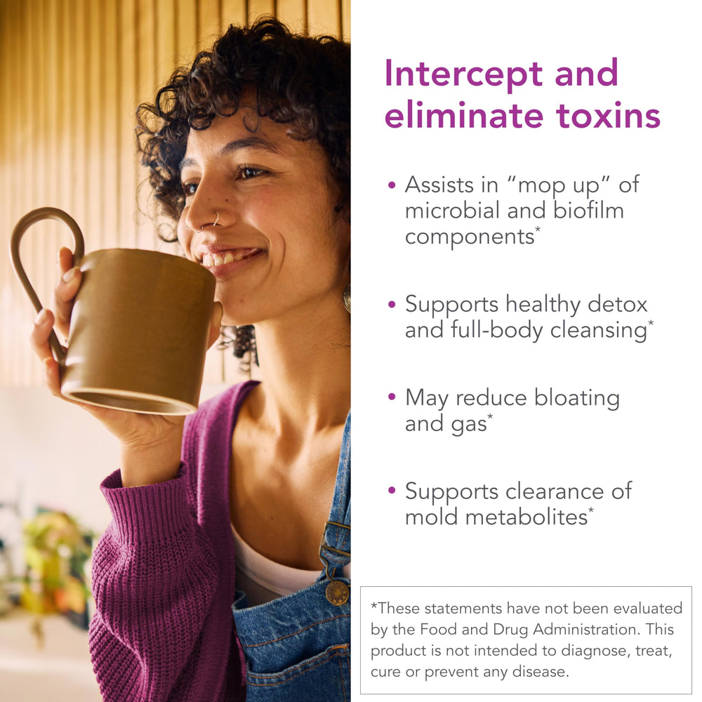 Biocidin G.I. Detox+ capsules in hand showing convenient broad-spectrum binding for toxin clearance.