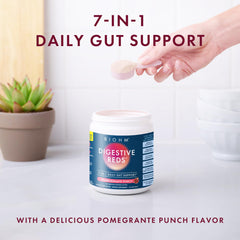 BIOHM Digestive Reds shaken with water for a smooth red berry drink