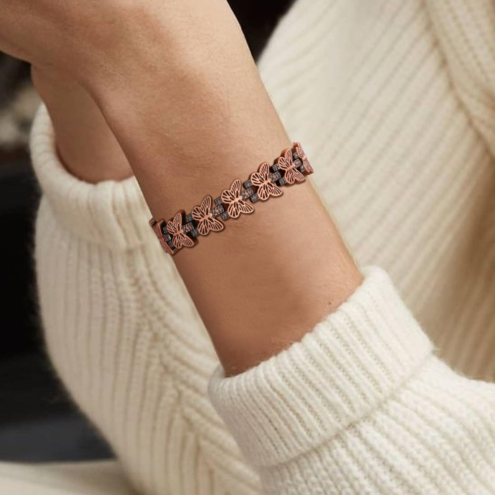 BioMag copper butterfly bracelet worn on wrist showing versatile style