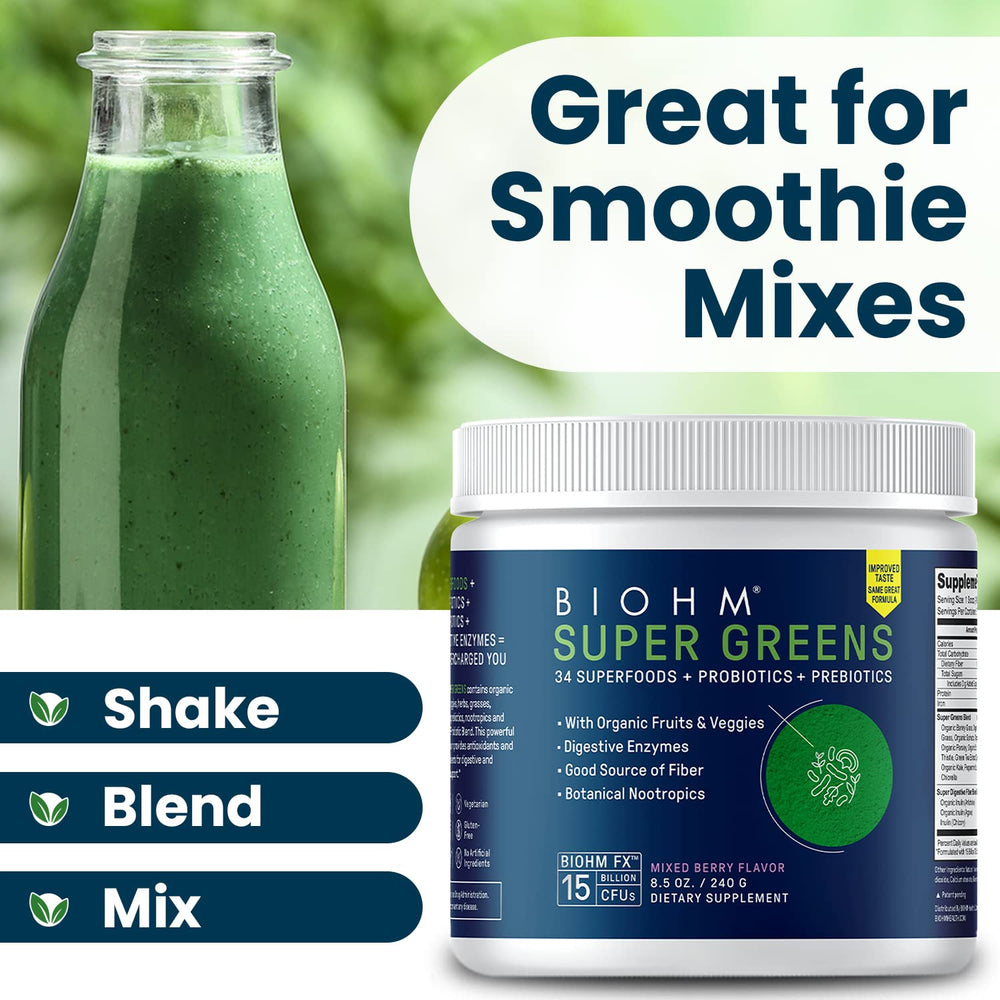 BIOHM Super Greens surrounded by fresh berries to emphasize mixed berry flavor.