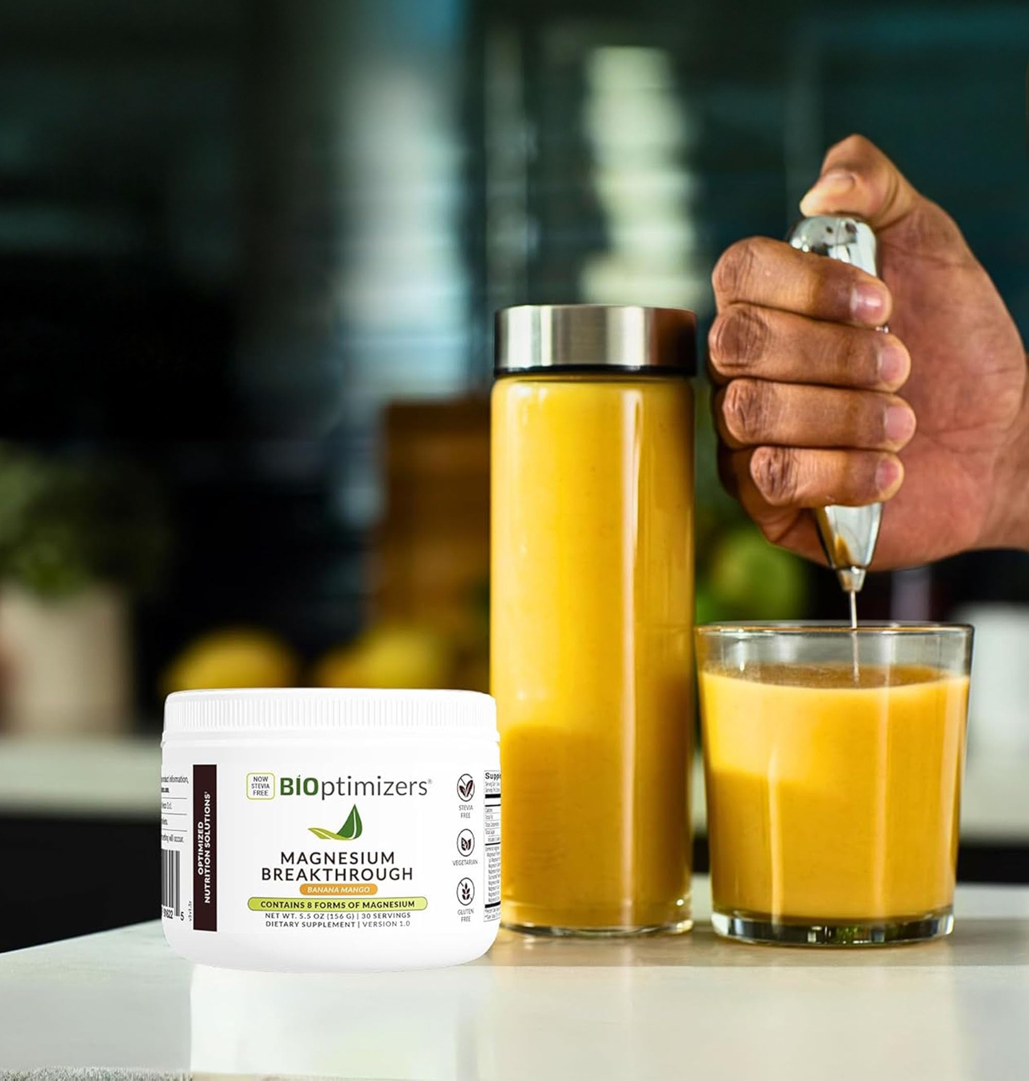 BiOptimizers Magnesium Breakthrough drink being poured with banana mango flavor