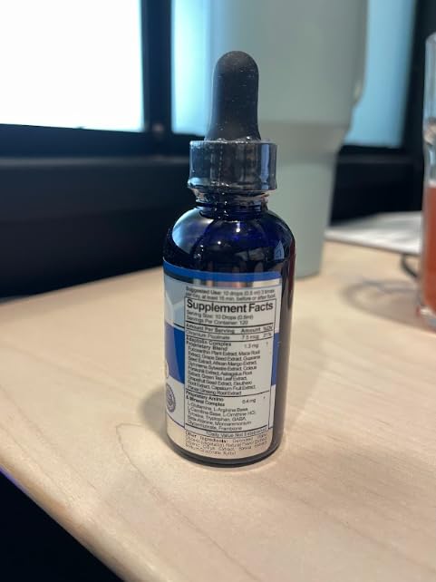 BioSource Labs Complex Diet Drops in hand to illustrate portable supplement for the VLCD plan