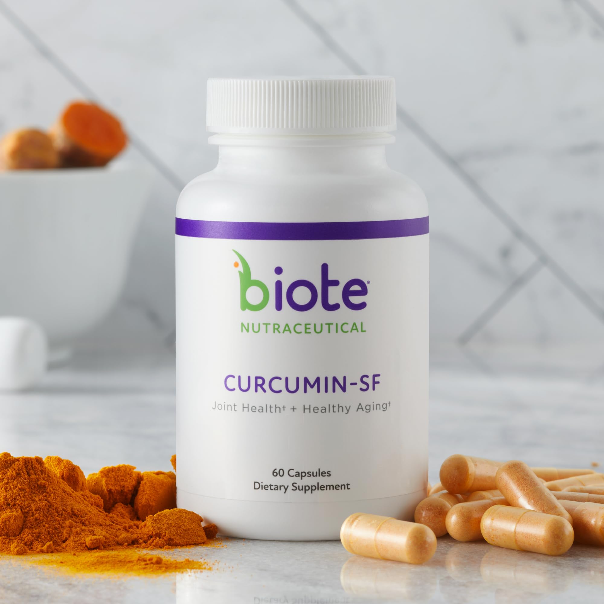 Close-up of Biote Curcumin SF capsules for joint comfort.