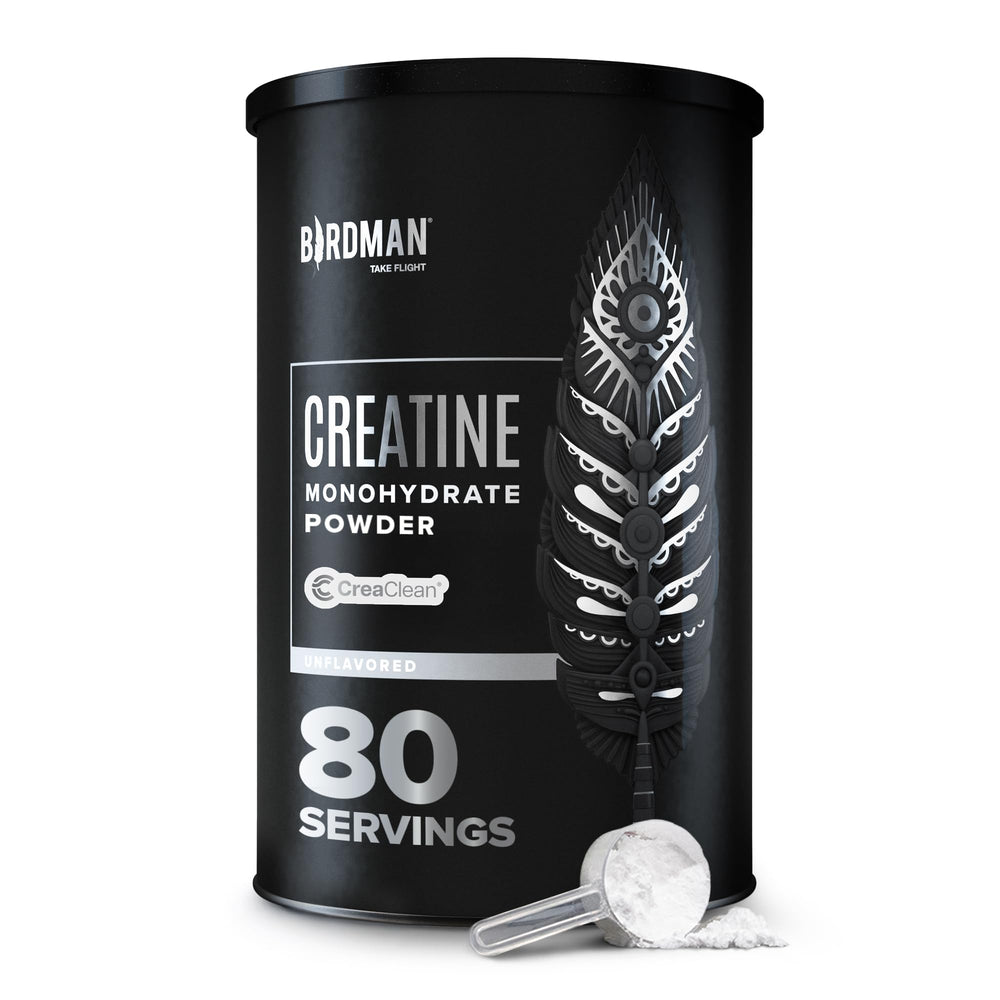 Birdman micronized creatine bottle closeup showing vegan, gluten-free formula for workouts.