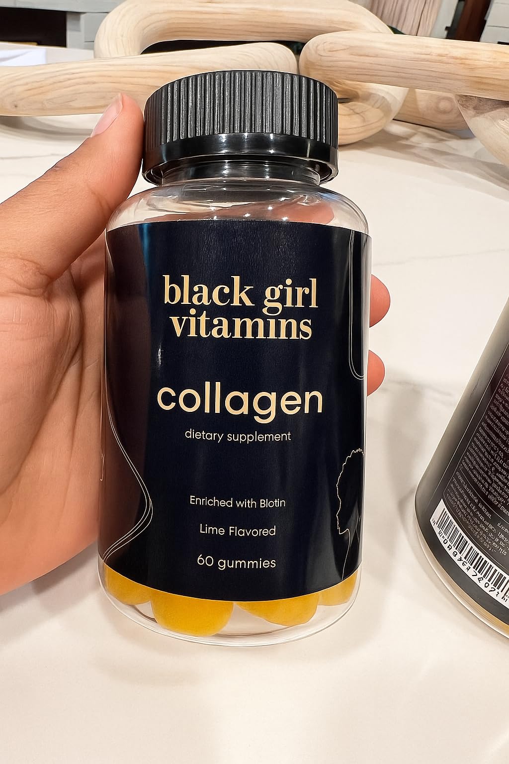 Black Girl Vitamins lime collagen gummies with label highlighting vitamin C and biotin