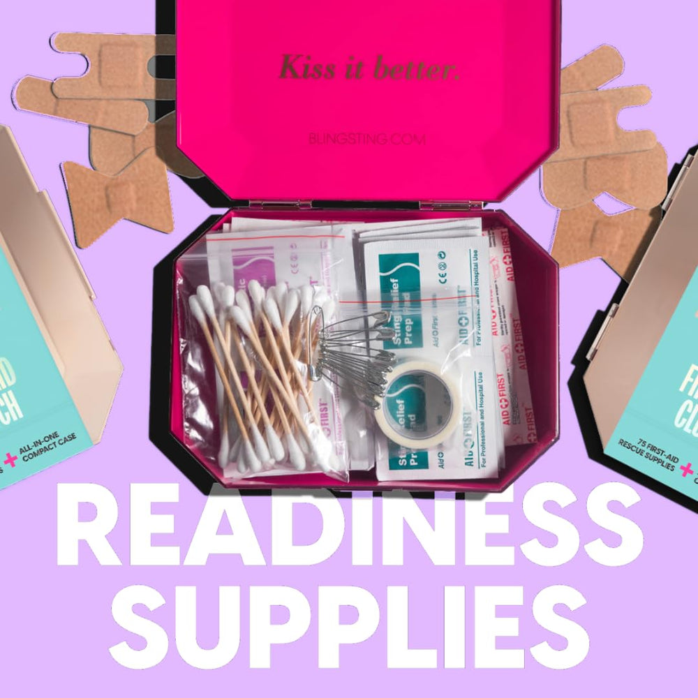 BLINGSTING First Aid Kit with pink interior keeps supplies organized.