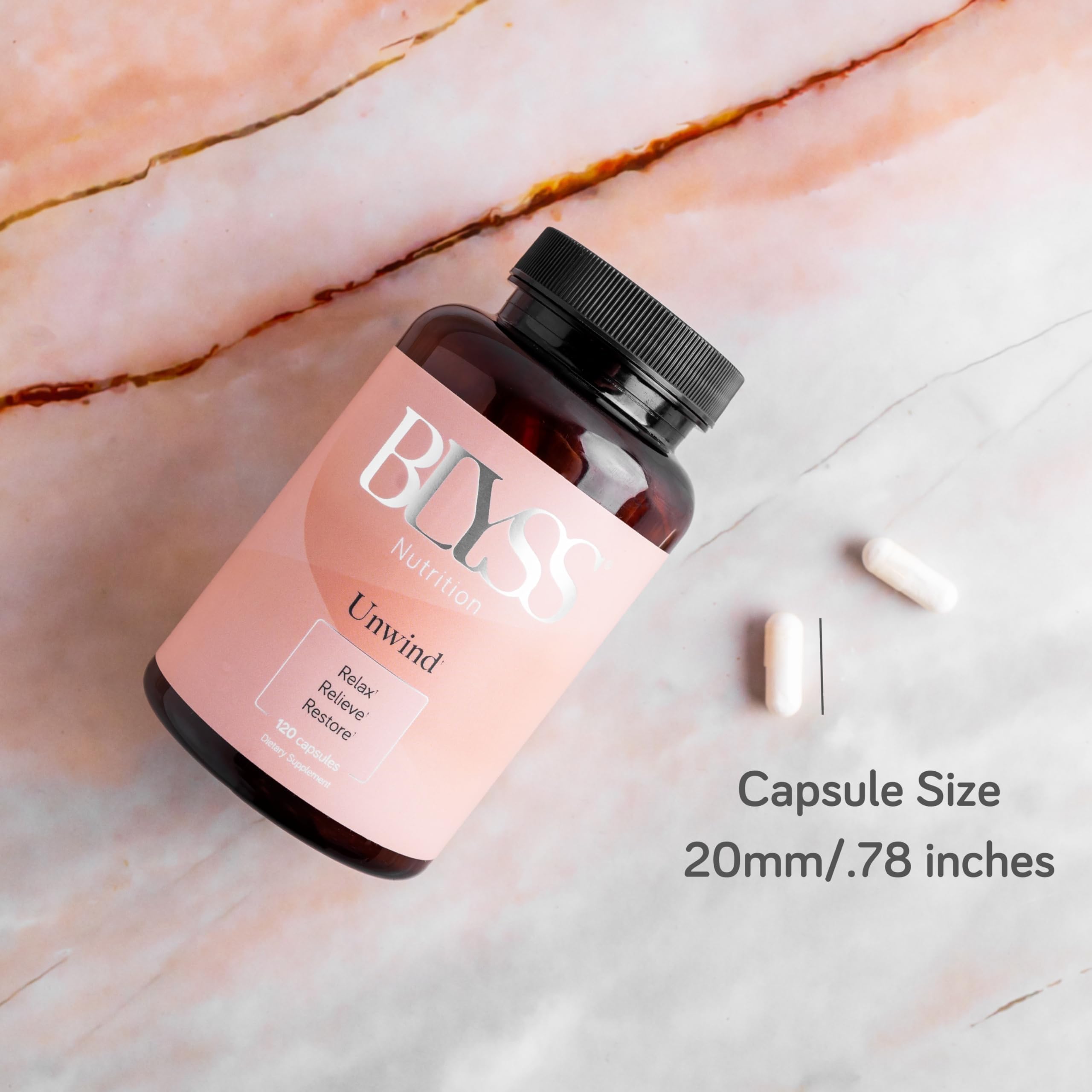 Pour shot of capsules ready to swallow with water