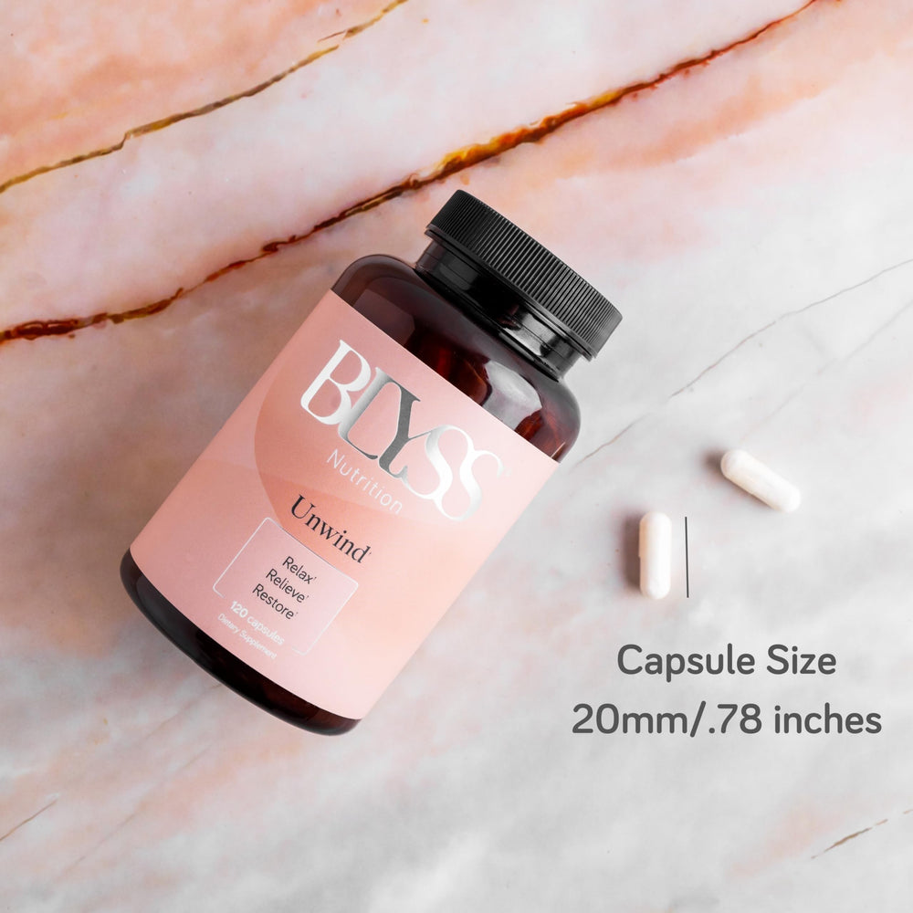 Pour shot of capsules ready to swallow with water