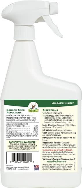 Applying Bobbex Deer Repellent to shrubs in the garden for deer deterrence.