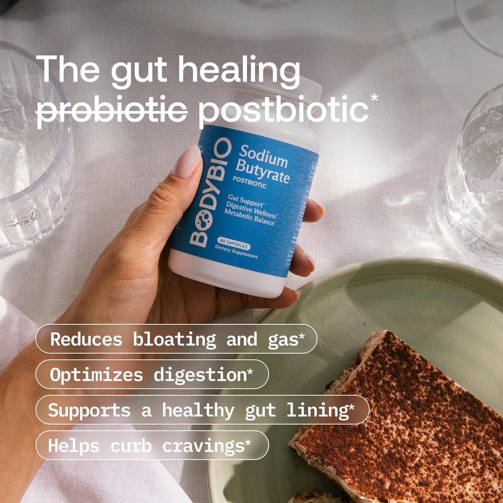 BodyBio Butyrate bottle being poured for convenient use.