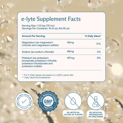 BodyBio e-Lyte bottle being poured into a glass for sugar-free hydration.