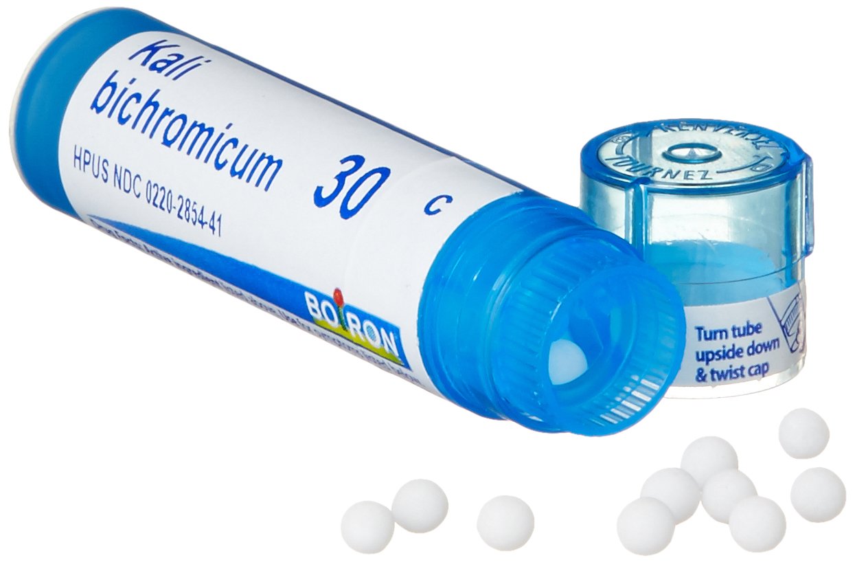 Kali Bichromicum 30C pellets closeup, natural ingredients.