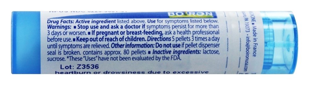 Boiron Nux Vomica 30C pellets close-up showing tiny pills for digestion support