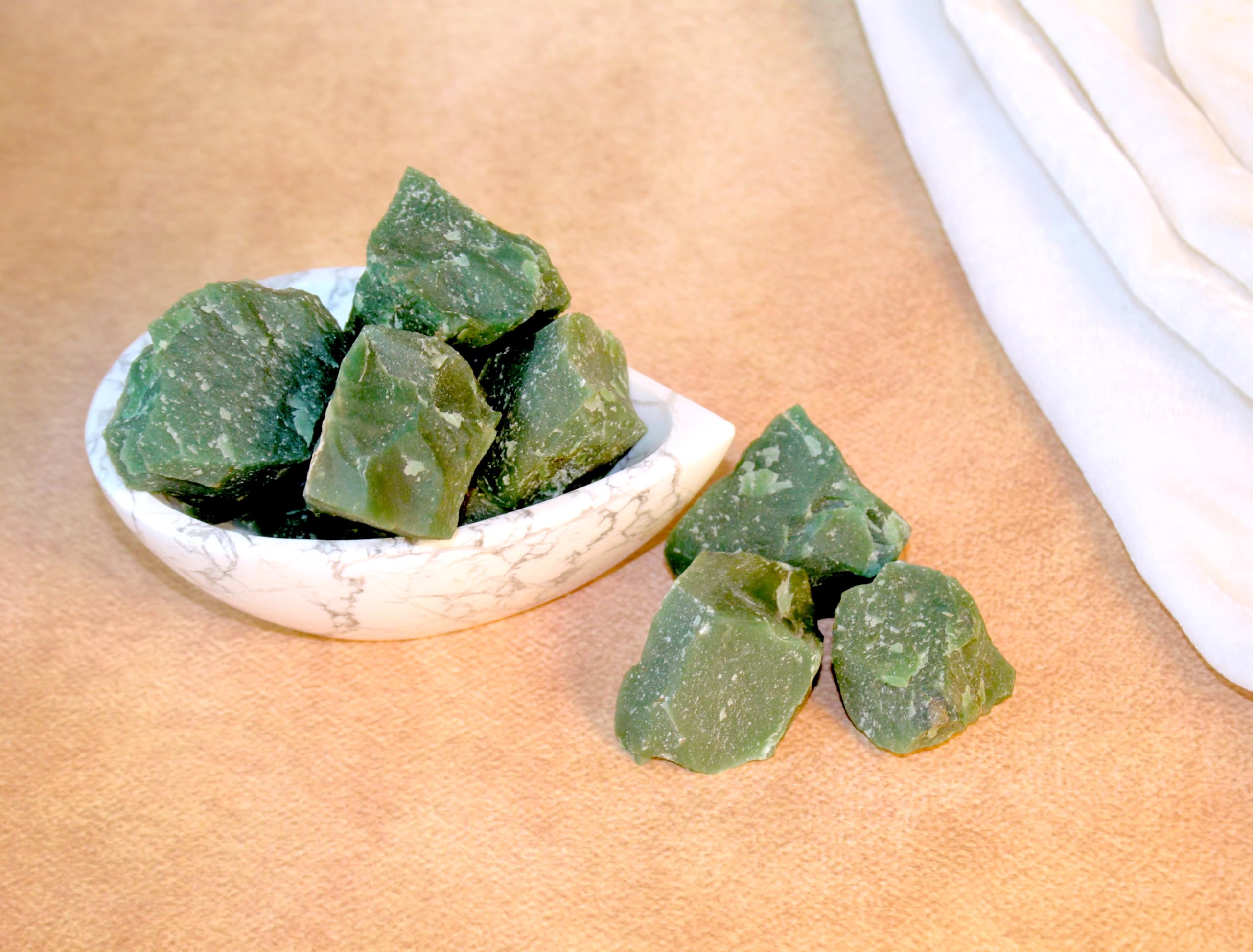 Bombay Crystals Export green jade natural formation showing unique inclusions