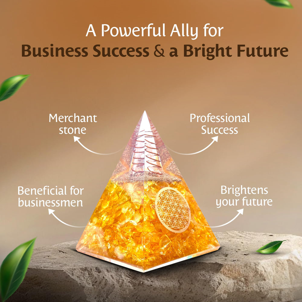 Bombay Crystals Export orgone citrine pyramid perched on a desk for decor and energy