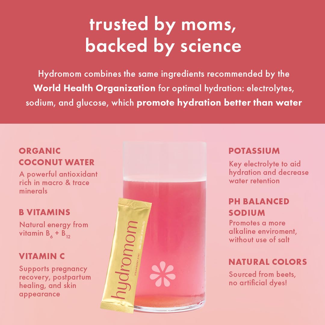 Boobie Hydromom lactation-friendly powder dissolving in water beside a baby bottle.