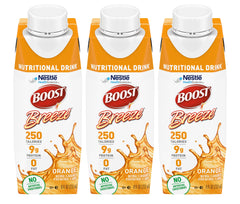 BOOST Breeze orange nutritional drink in a glass, on-the-go energy.
