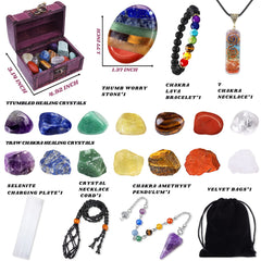 BORAMDO chakra stones, raw and tumbled, arranged for energy balance.