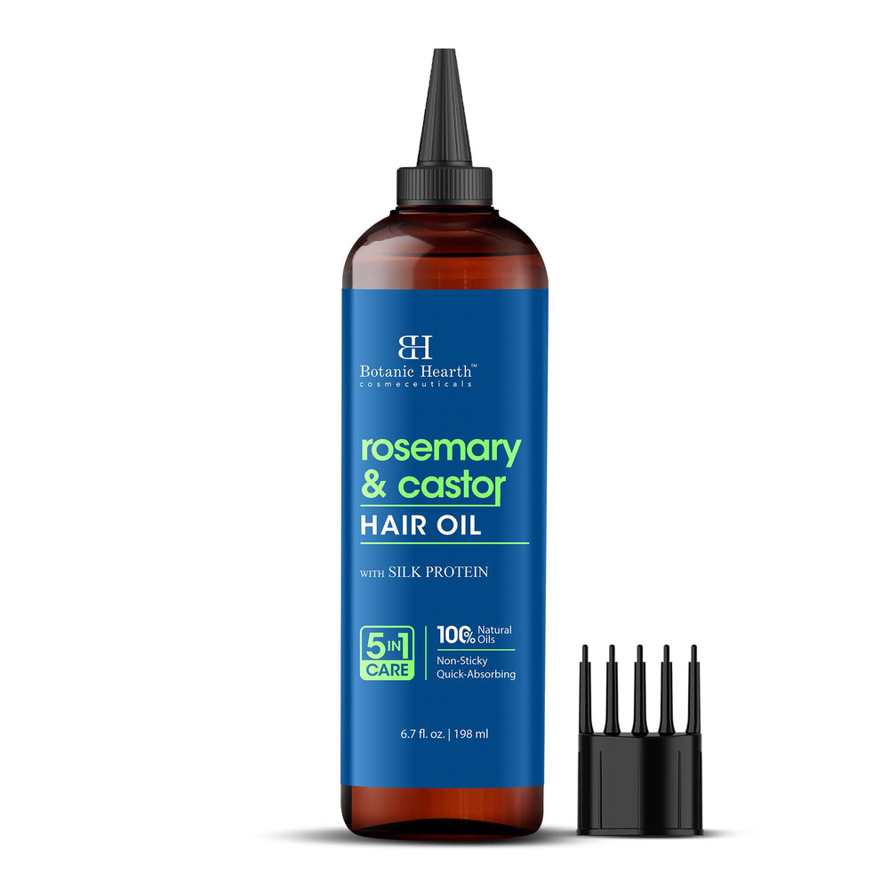 Botanic Hearth rosemary castor hair oil bottle pour showing convenient dosing for scalp care