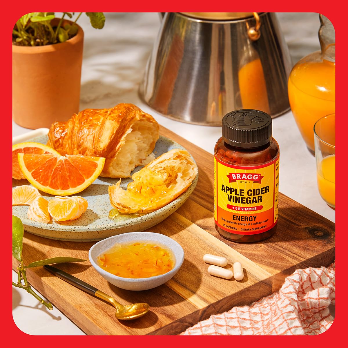 Bragg Energy ACV capsules on kitchen counter suggesting easy daily routine.