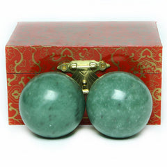 Brass Statu BRABUD 1.57-inch marble green Baoding ball pair close-up texture for focus.