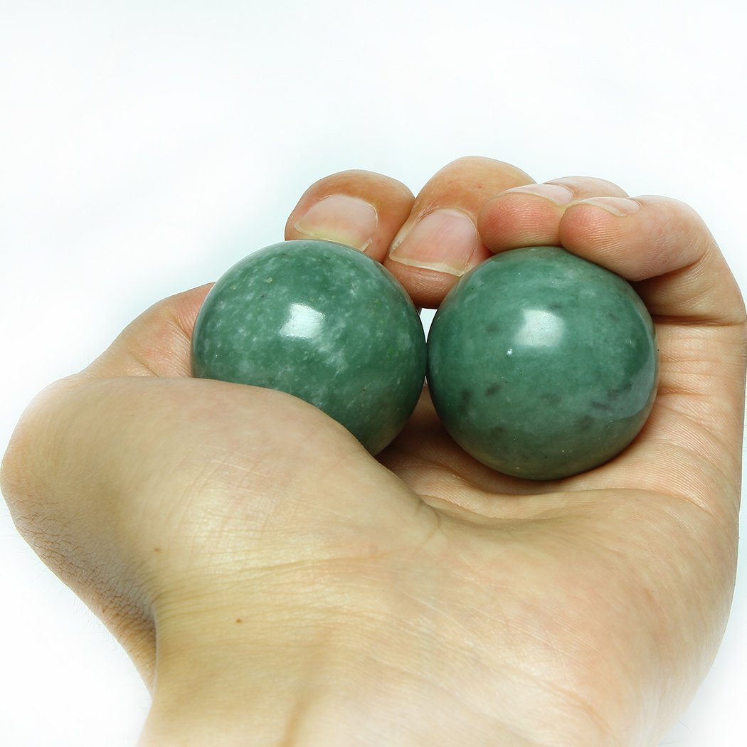 Brass Statu BRABUD marble green Baoding ball texture close-up showing elegant color.