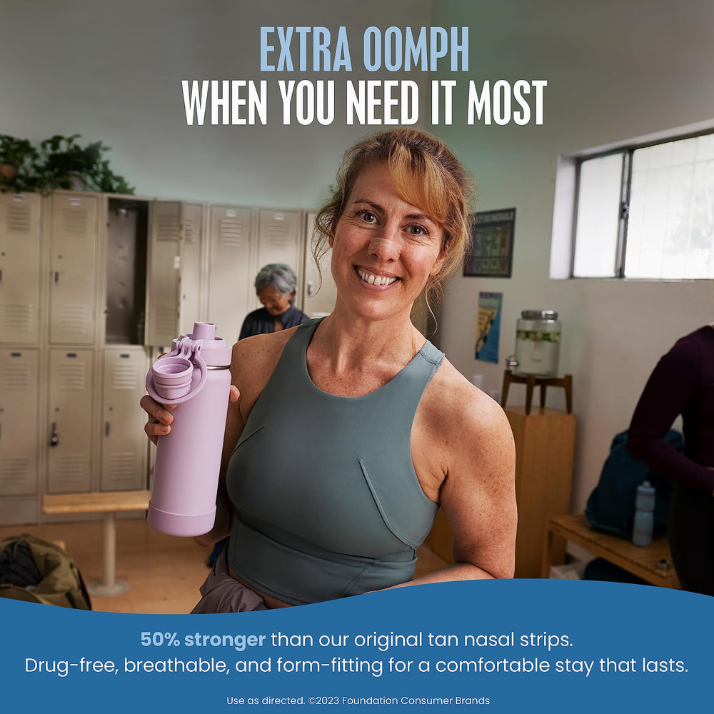 Person applying the tan nasal strip before sleep for snoring relief