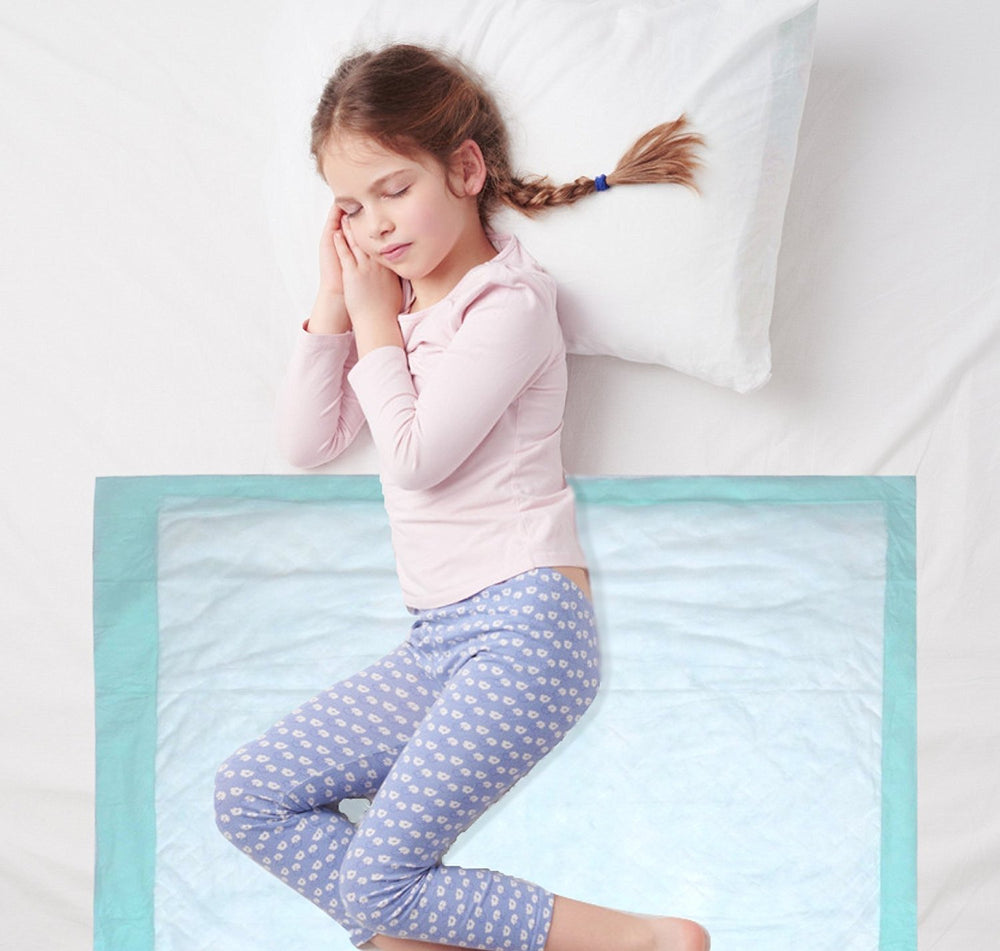 BrightCare bed pad in use with adult caregiver scenario for comfort