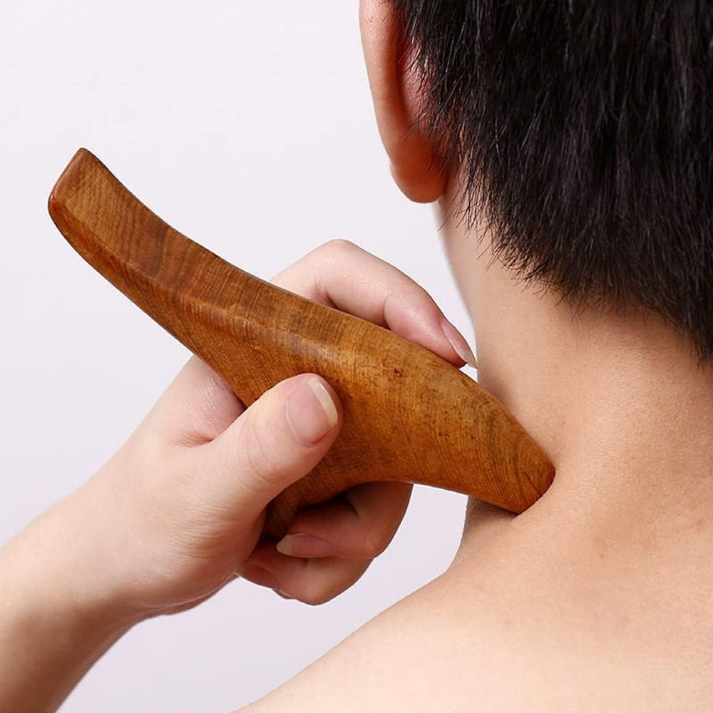 Broman Triangle Massager arc edge targets larger surfaces for soothing strokes.