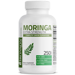 Pouring Bronson Moringa capsules for easy daily use.