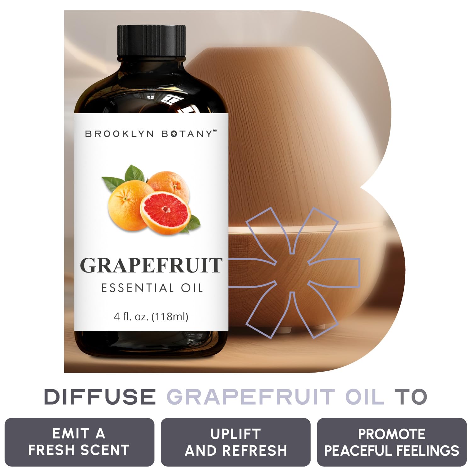 Grapefruit oil being diluted on skin with a carrier oil by Brooklyn Botany