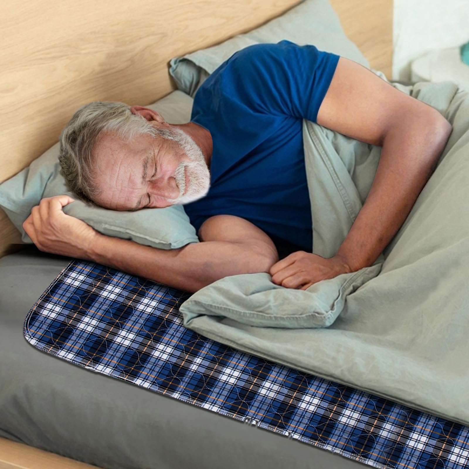 Brosive bed pad in use on an adult bed protecting sheets overnight