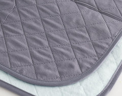 Brosive grey design bed pad reduces visible staining.