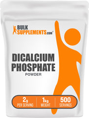 BulkSupplements Dicalcium Phosphate powder poured into a measuring cup for easy blending.