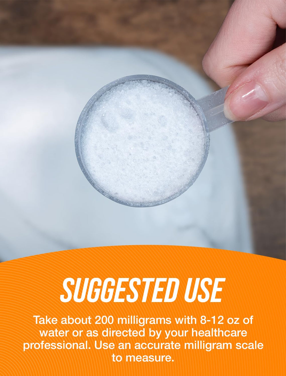 BulkSupplements L-Theanine powder pouring into a beverage for mixing