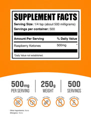 Spoon of BulkSupplements Raspberry Ketones powder with label visible for measurement
