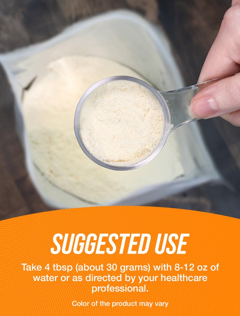 BulkSupplements Whey Protein Isolate powder being poured into a glass for easy blending.