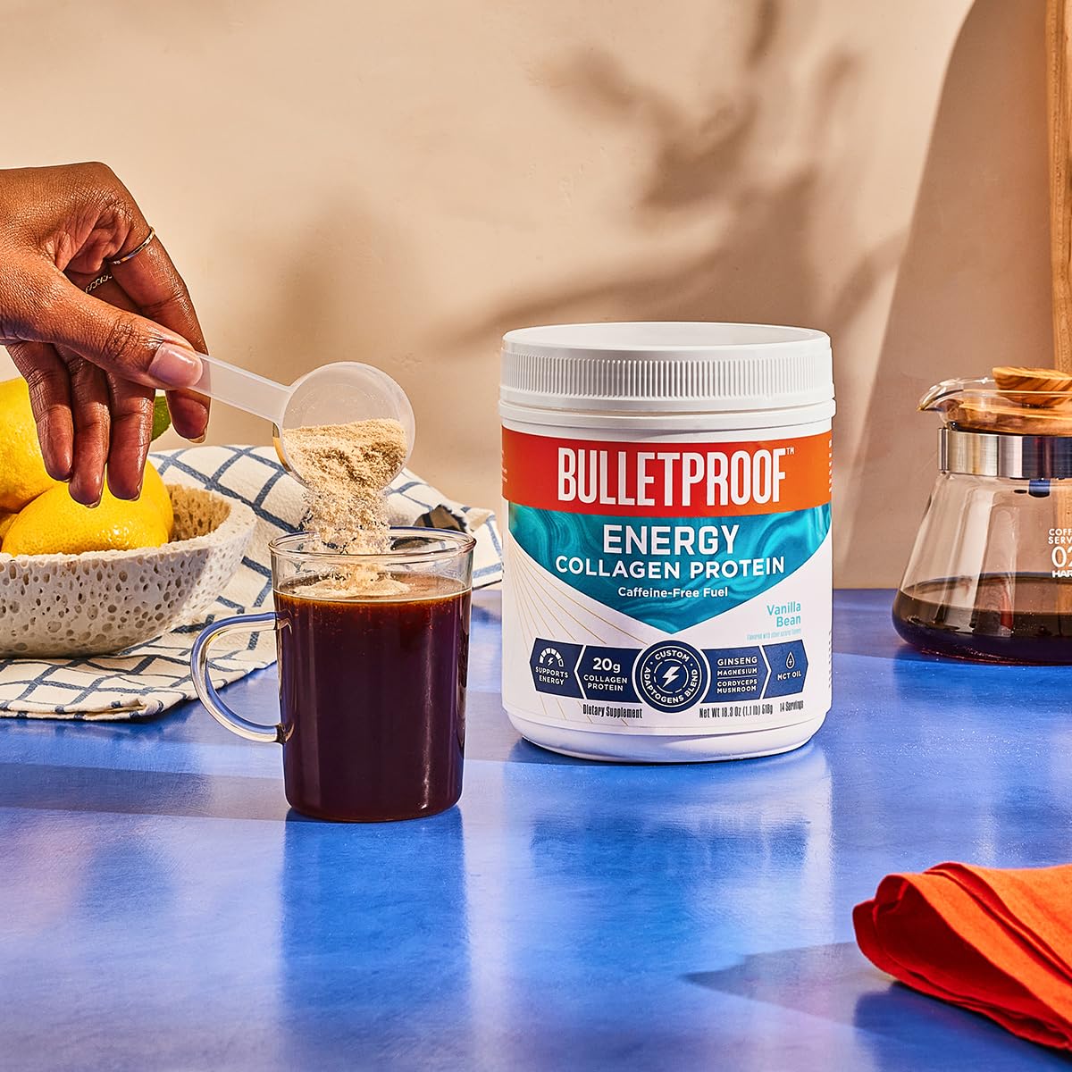 Glass with Bulletproof vanilla bean collagen shake ready to sip
