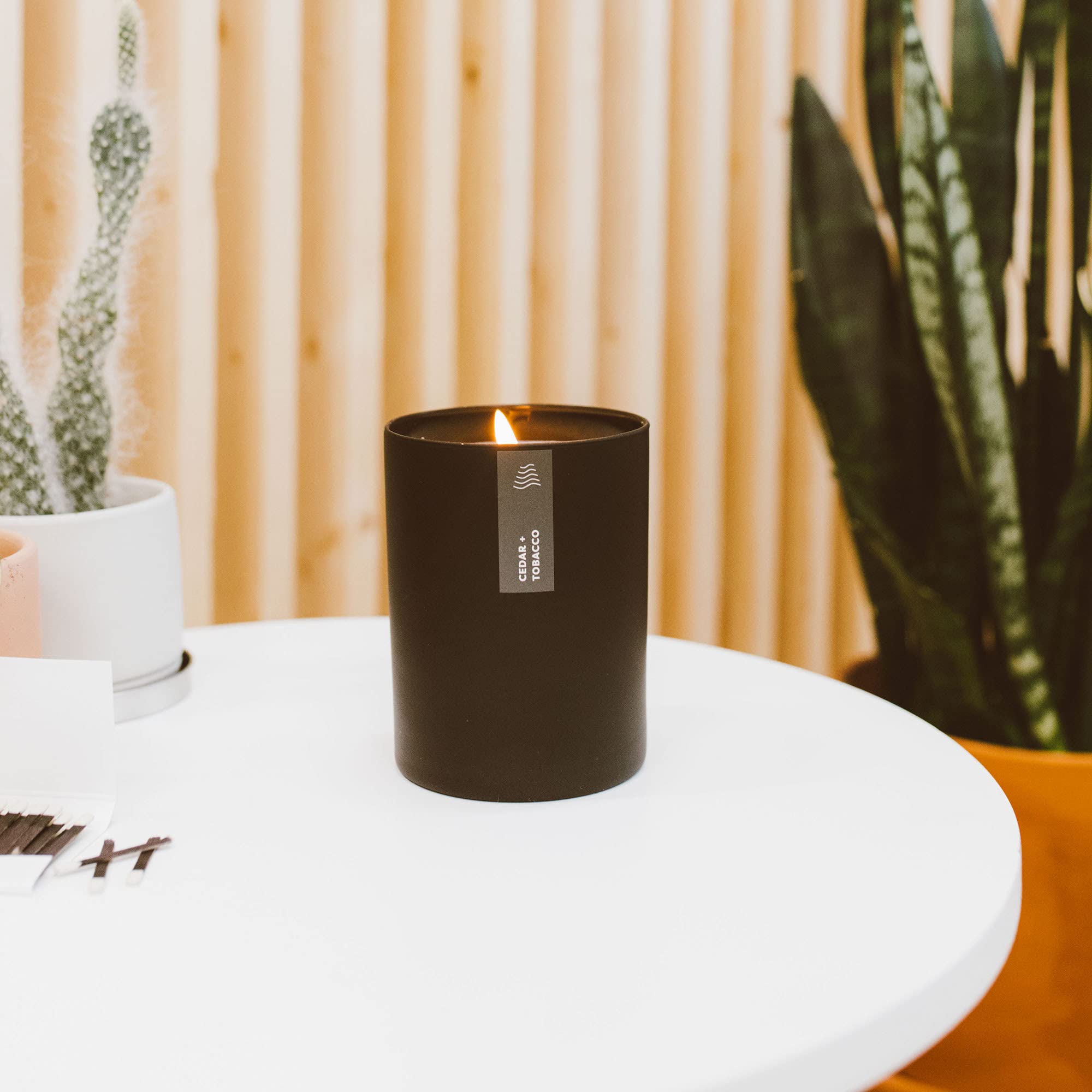 Calyan candle in a large living room boosts cozy ambiance.