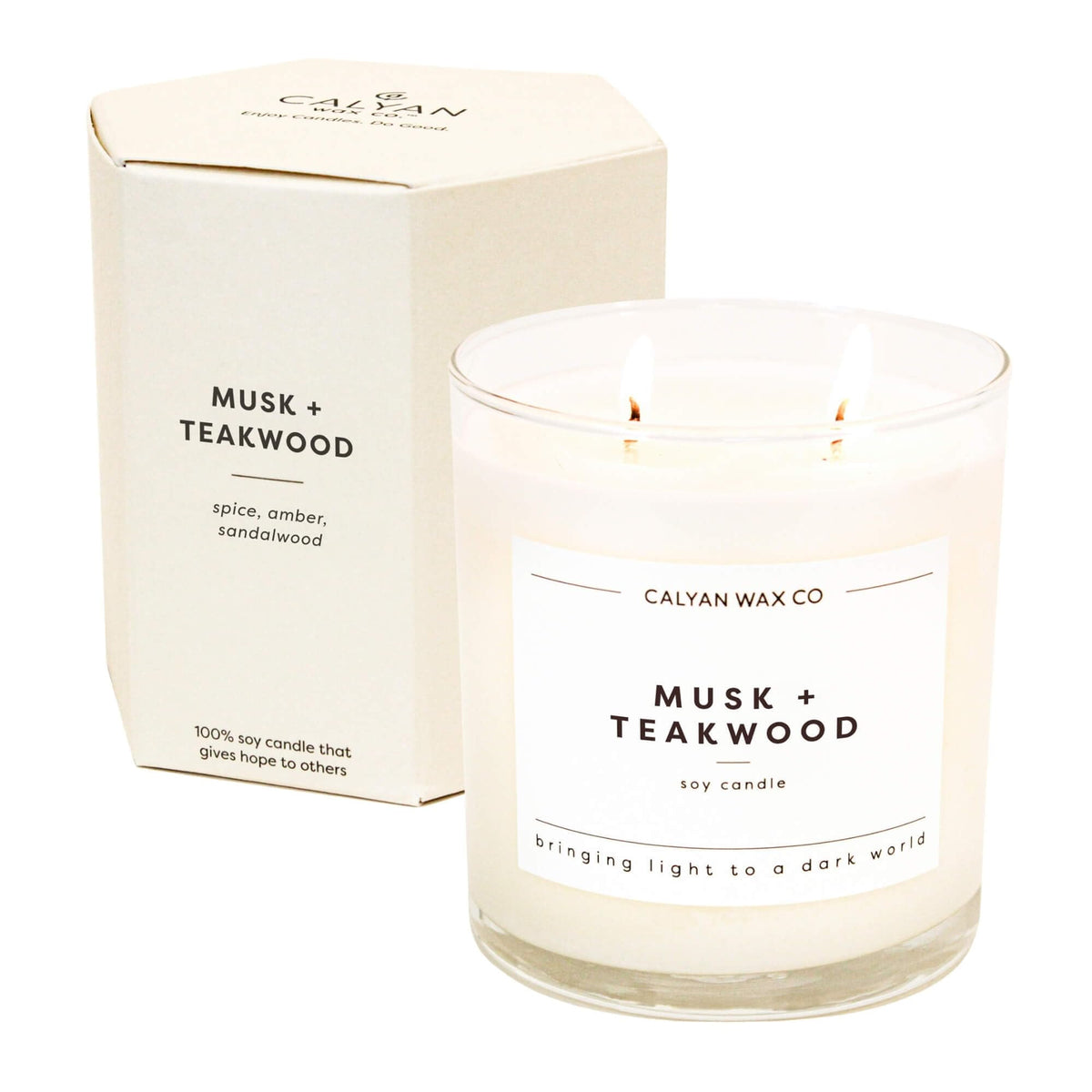 Calyan Musk Teakwood 2-Wick Candle in a glass jar for a warm, inviting ambiance.