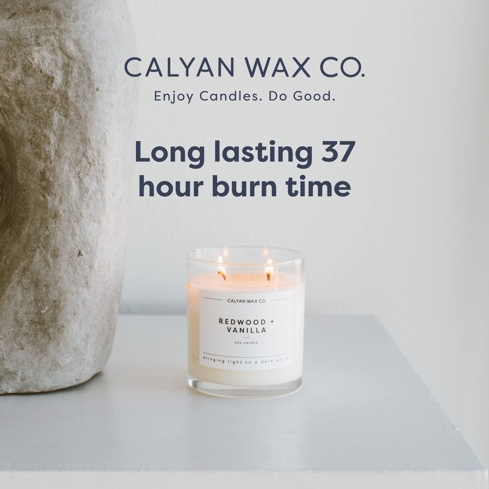 Calyan soy wax hand-poured candle shown for home use.