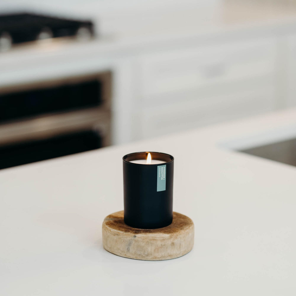 Calyan Wax Co Evergreen Eucalyptus candle in a sleek jar elevates night-time routines