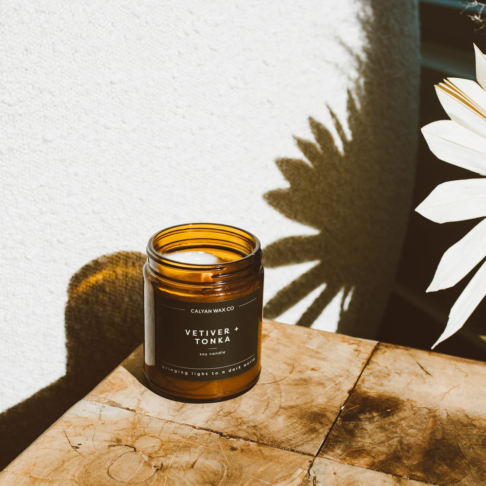 Gift-ready packaging for Calyan Wax Co. Oakmoss & Amber candle.