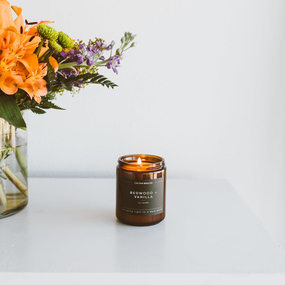 Calyan Wax Co. Redwood & Vanilla in a cozy room setting for medium spaces